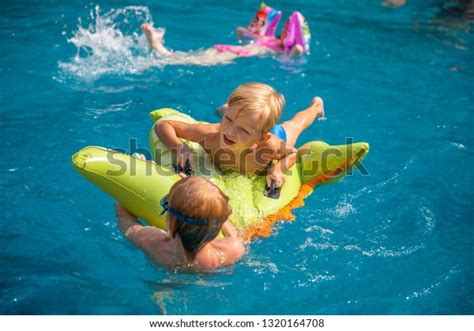 Two Little Boys Having Fun Pool Stock Photo Edit Now 1320164708
