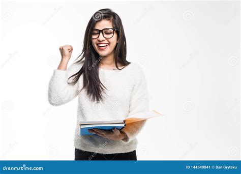 Portrait Of Attractive Indian Student Woman Standing Holding Reading A
