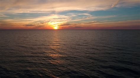 Aerial Shot Of Stunning Ocean Sunset Above Stock Footage Sbv 308642581