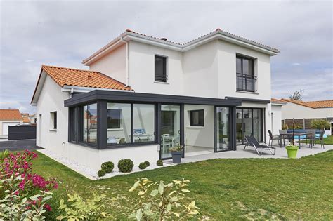 Les projets d'extension de maison de cybel extension reflètent particulièrement cet engouement. Véranda à toit plat - Réalisation Fillonneau | Extension ...
