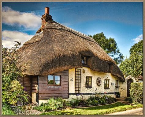 Thatched Cottage In The Village Of Longstock In Hampshire Thatched