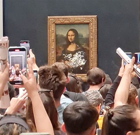 Man Arrested After Smearing Mona Lisa With Cake At Louvre New Straits