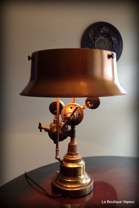Scissor industrial wall sconce with a fully dim able light socket. Steampunk Table Lamp made from Vintage Torch • iD Lights