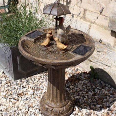 This is one of the most affordable solar a solar water pump with an included battery that can be charged through the solar panel provides an effective way of setting up a fountain without. Smart Solar Garden Water Fountain | Duck Family | Oasis ...