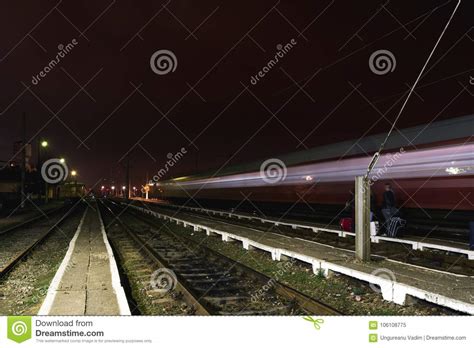 Train Passing By A Rural Railway Station In Romania Editorial Image