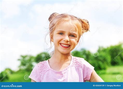 Beautiful Little Girl Smiles At Camera Stock Image Image Of Blue