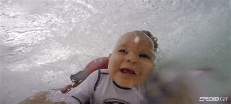 Awesomely Cute 9 Month Old Baby Surfs With His Dad For The First Time