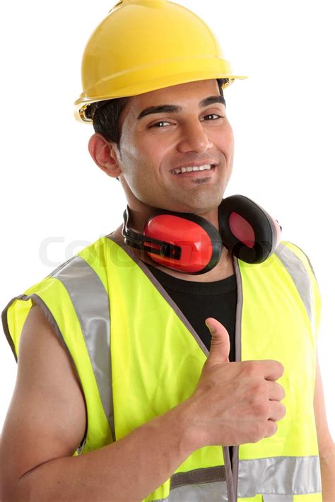 Smiling Builder Construction Worker Or Other Trades Man Showing A