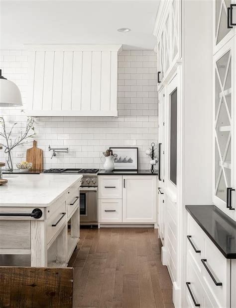 We did not find results for: Cottage kitchen boasts a shiplap kitchen hood around all ...