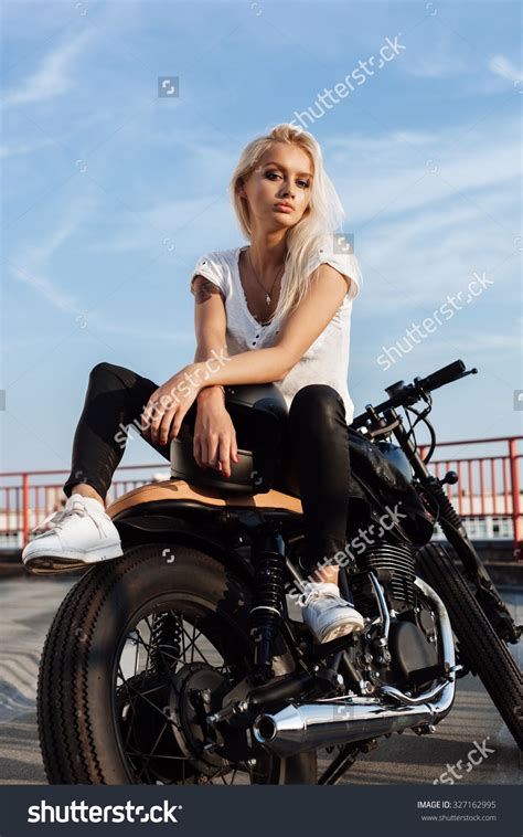 Biker Girl Sitting On Vintage Custom Motorcycle Outdoor Lifestyle Portrait Cafe Racer Girl