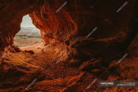 Desert Cave Entrance Overlooking The Suburbs Of St George Utah