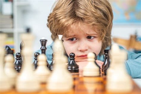 Cute Little Boy Playing Chess Thinking Kid Concentrated Boy