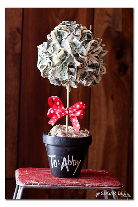 Maybe you would like to learn more about one of these? Money Topiary Gift Idea - Sugar Bee Crafts