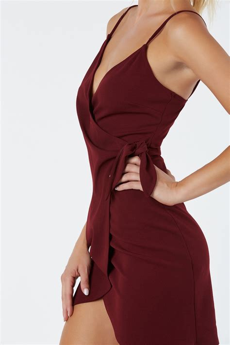 Sleeveless Wrap Dress With Bold Knot Detailing Flattering Fit With Tulip Hem Finish Vestidos