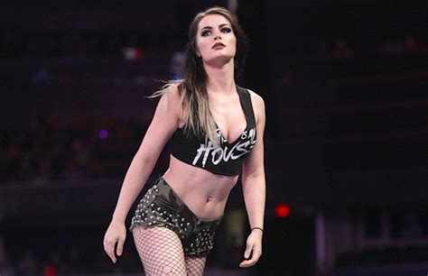 paige and two other absent wwe stars backstage at raw wwe s top 10 cage dives