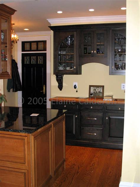 Painted maple cabinets in a casual kitchen omega. Canyon Creek Cabinetry, Cherry Inset Door, Maple Painted ...