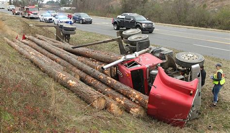 Log Truck Overturns