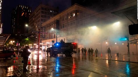 Man Charged With Stealing A Police Gun During Seattle Protests Cnn