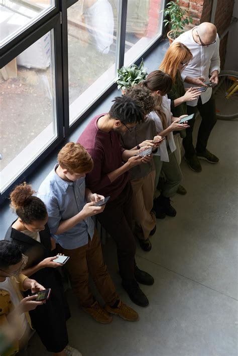People Holding Their Phones · Free Stock Photo