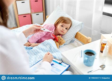 Doctor Measuring Sick Girl S Temperature Stock Image Image Of