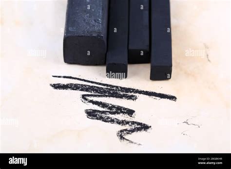 Black Drawing Charcoals On Paper Stock Photo Alamy