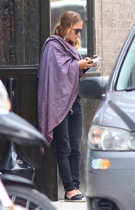 Mary Kate Olsen Enjoys Another Smoke Break In Her Favourite Pashmina