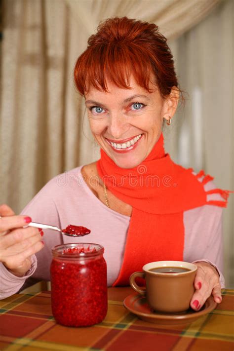 A Smiling Woman Holding A Cup Of Tea Stock Image Image Of Alternative
