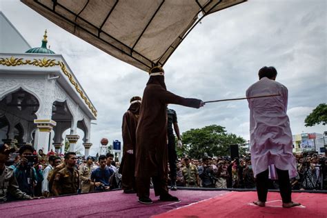 Gay Couple In Indonesia Caned 83 Times In Front Of Crowd