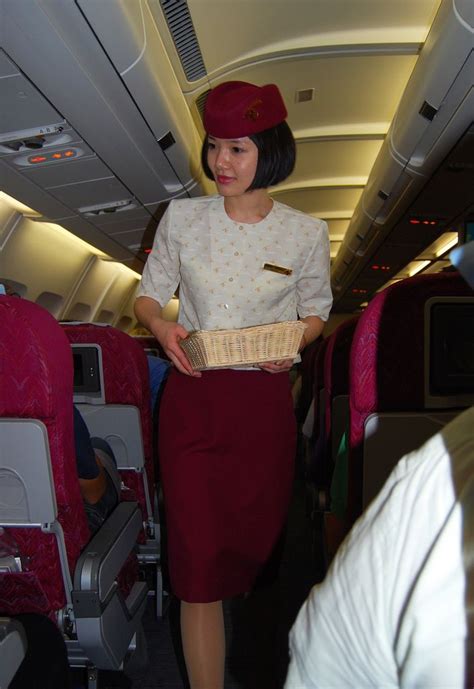 Service With A Smile Cabin Crew Qatar Airways Cabin Crew Flight Attendant Uniform
