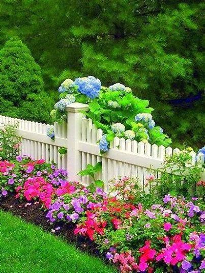 Beautiful Flower Bed Along Fence Pictures Photos And Images For