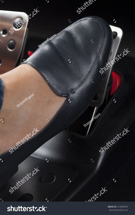 Womans Foot Pressing Gas Pedal Stock Photo 219099937