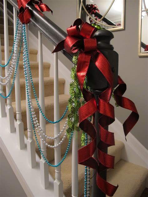 Ribbon Clusters With Draped Beads On A Small Banister Add Christmas
