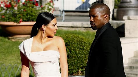 kim kardashian and kanye west split a look back at their wedding day entertainment tonight