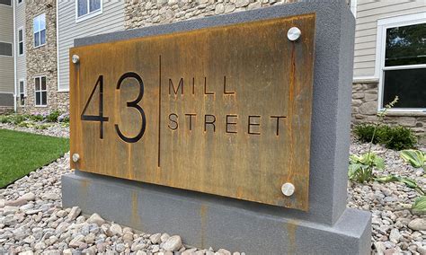 Mill Street Apartments Laser Engraved Steel Monument Sign Elevated
