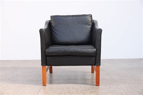 Vintage david rowland mcm 40/4 gf chair, natural wood. Black Leather Armchair - The Vintage Shop