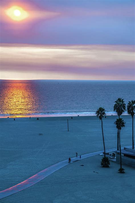 Sunset At Santa Monica Beach And Pier Photograph By Alex Grichenko