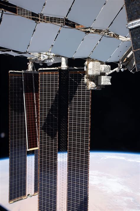 Iss Astronauts Install Advanced Solar Arrays Provided By B