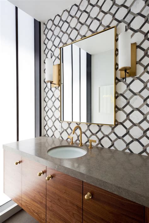 Modern Powder Room With Chain Link Print Wallpaper And Gold Fixtures