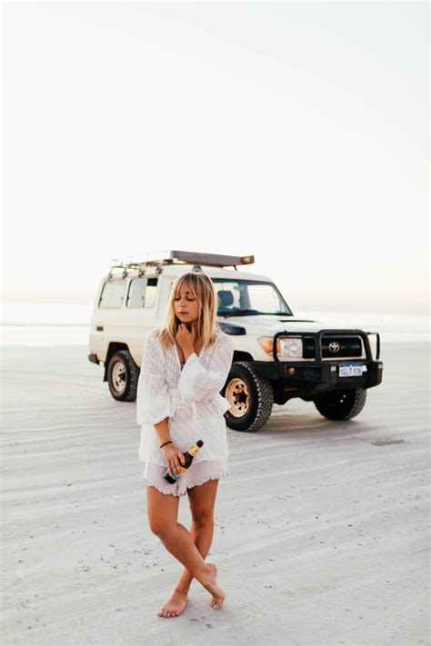 Woman In White Lace Dress Standing Beside White Suv · Free Stock Photo