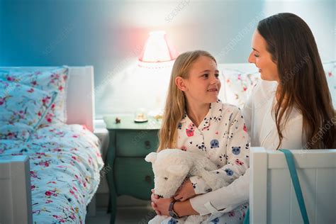 Mother And Babe Talking At Bedtime Stock Image F Science Photo Library