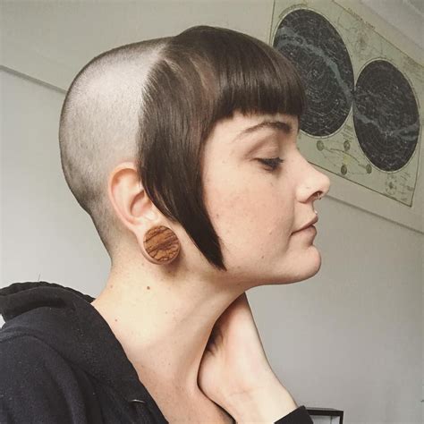 hairstyle with half head shaved short hair wavy haircut