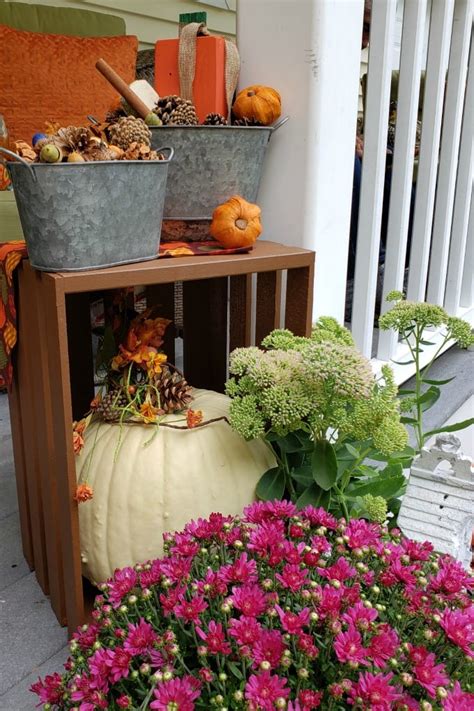 Fall Porch Decorating Ideas With Crates Pumpkins And Mums Juggling