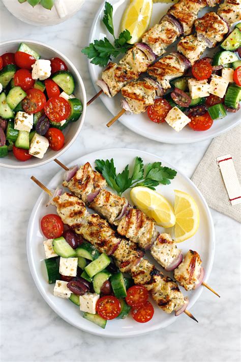Grilled Greek Chicken Kebabs With Cucumber Tomato And Feta Salad Two