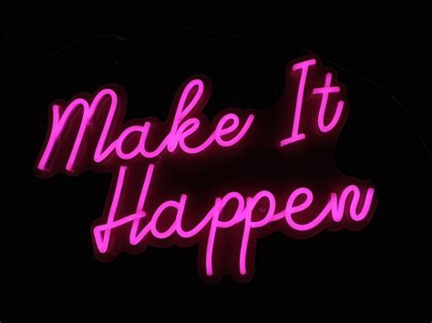 A Neon Sign That Says Make It Happen