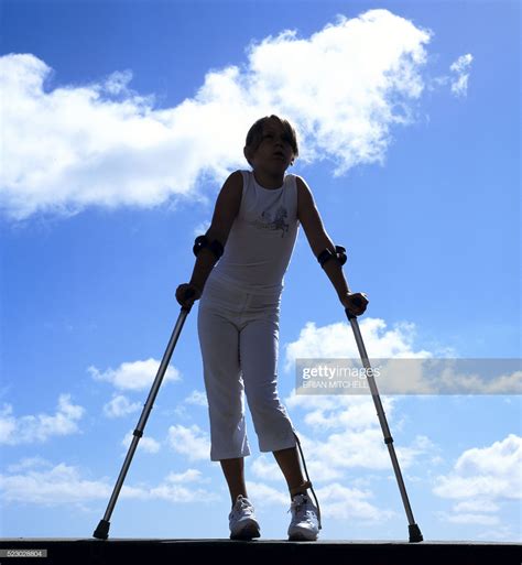 Stock Photo Disabled Girl With Leg Brace Aged 11 Years Using Elbow
