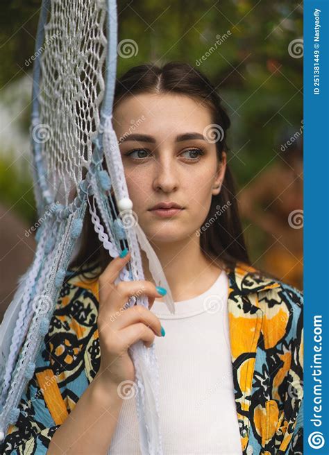 Portrait Of A Girl Holding A Glass Eye Hanging By A Thread Stock Image Image Of Lifestyle