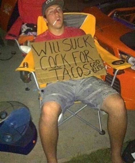 A Man Sitting In A Lawn Chair Holding A Sign That Says Will Suk Cook For Tacos