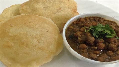 To make the bhature, heat the. छोले भठूरे | Chole Bhature Street Food | Chana Bhatura ...