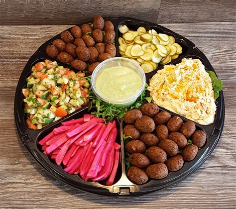 I'm going to guess that you'll be visiting greece and would like to eat greek food! Falafel Platter Near Me | Falafel, Platters, Food