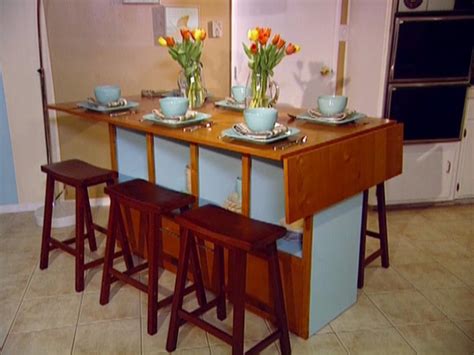 Drop leaf tables and folding chairs are versatile. Build a Bar-Height Dining Table | HGTV